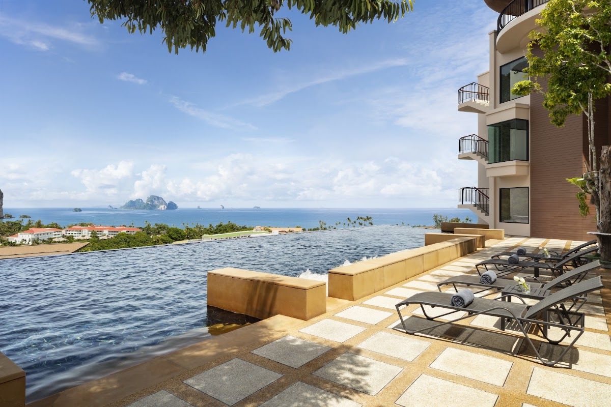 Avani Ao Nang Cliff Krabi Resort pool with sea views and limestone karst islands offshore