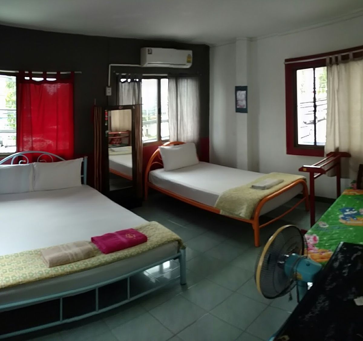 Mr. Clean Guesthouse pool and grounds in Krabi Town